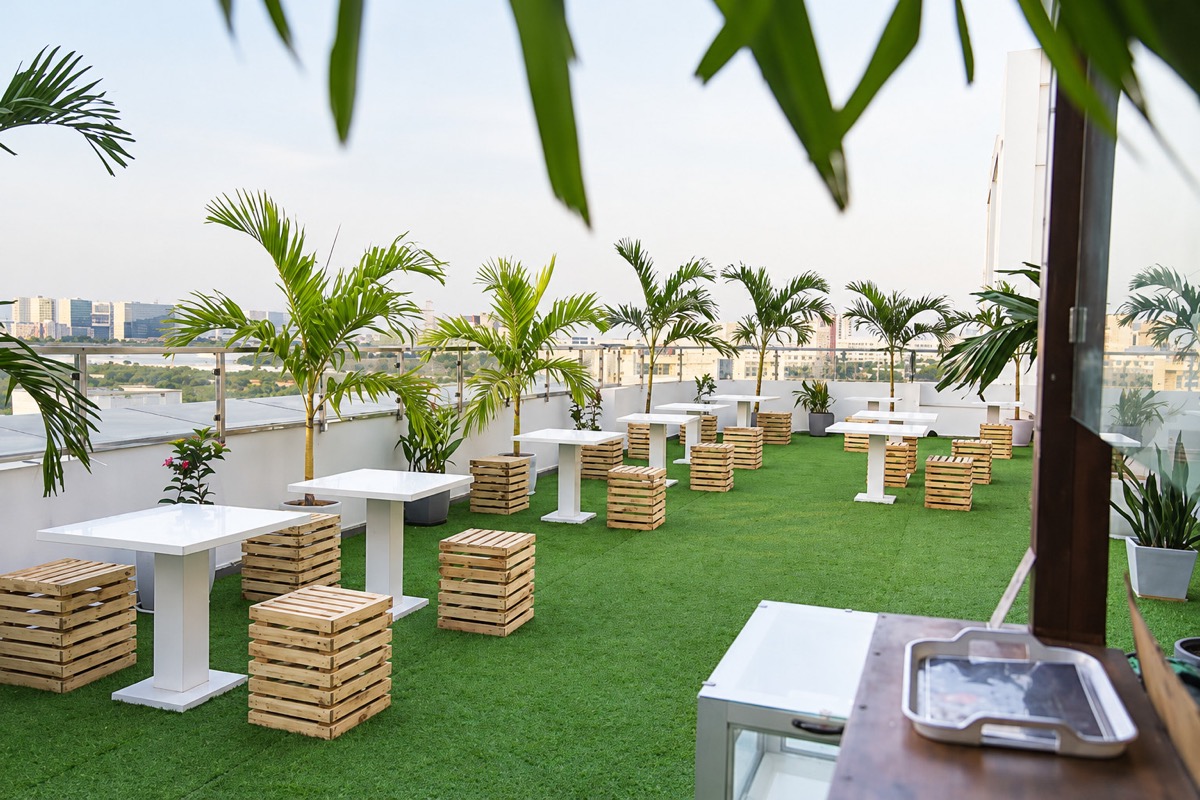 City-view café and rooftop terrace seating at Sekaran Residency, Perumbakkam
