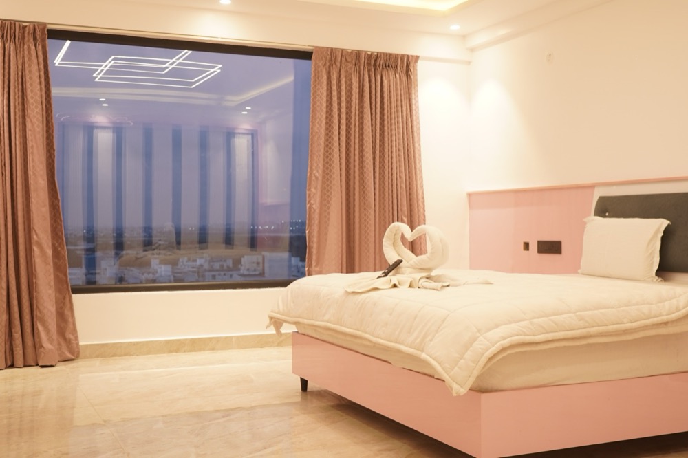 Super Deluxe Room at Sekaran Residency, Perumbakkam, with a city view